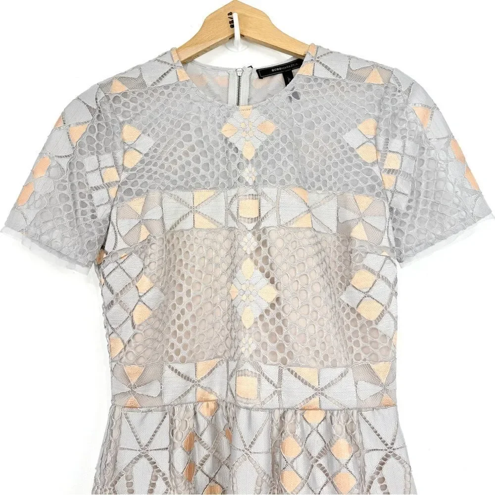 BCBGMAXAZRIA Light Dusk Contemporary Geometric Lace Mesh Overlay Peplum Blouse